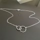 Collier 2 anneaux entrelacés en argent massif 925/000